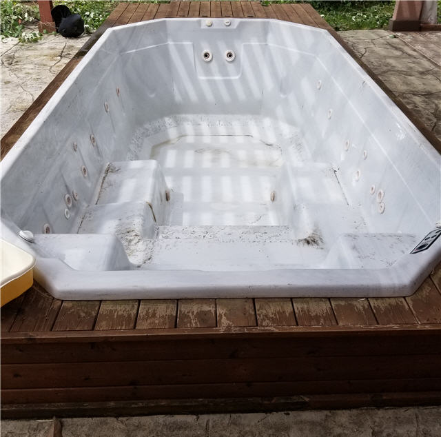 hot tub becomes raised bed garden for lost book of remedies